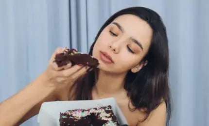 woman eating chocolate